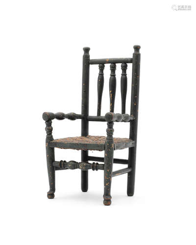 A Victorian miniature green-painted ash spindle-back armchair, circa 1850