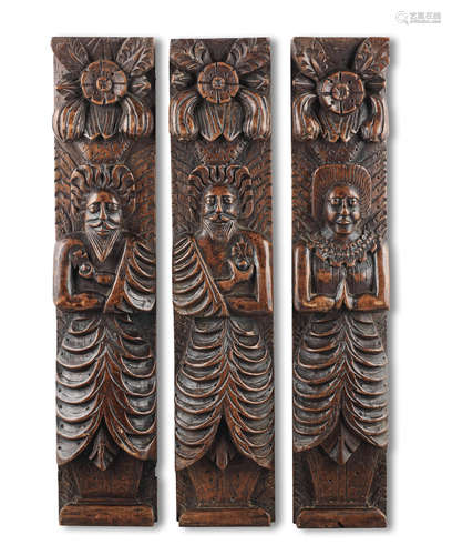 A set of three James I carved oak figural terms, circa 1620