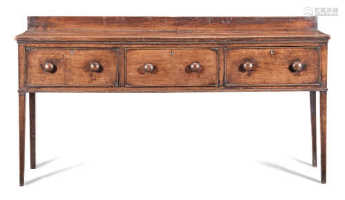 A George III joined fruitwood open low dresser base, circa 1800-20