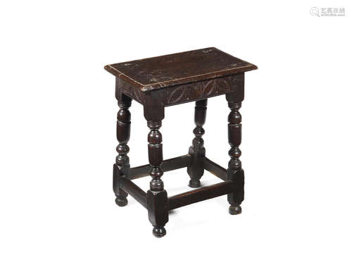 A mid-17th century oak joint stool, English, circa 1650