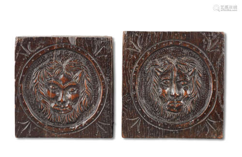 A small pair of carved oak panels