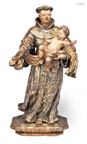 A polychrome-decorated and gilt-highlighted carved sculpture of a male saint, probably St. Anthony of Padua, Southern European