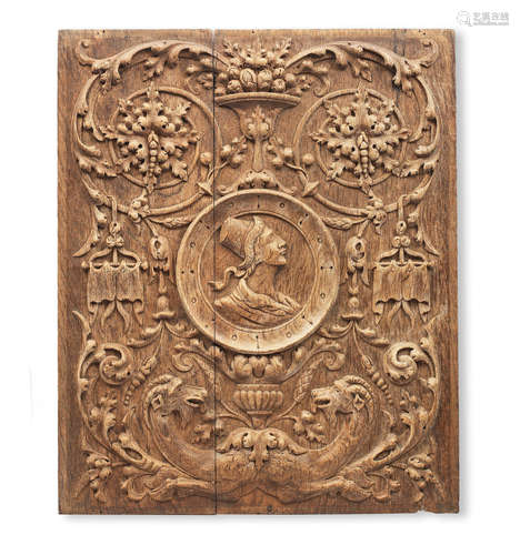 A set of seven mid-16th century carved oak 'Romayne'-type panels, Flemish, circa 1550