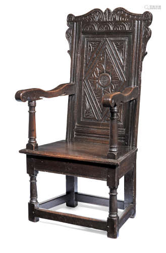A Charles I joined oak panel-back open armchair, West Country,  circa 1640