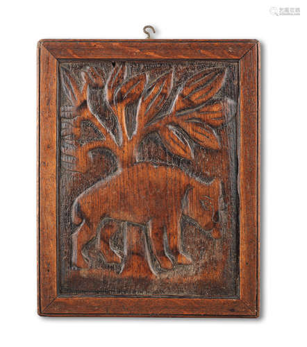 A naively carved pine or softwood panel