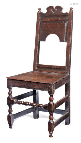 A Charles II joined oak backstool, North Country, circa 1680