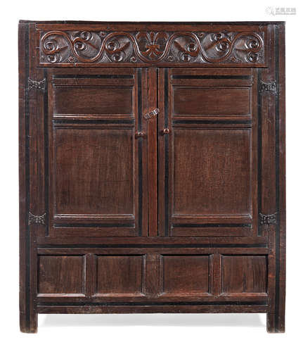 A Charles II joined oak livery cupboard, West Country, circa 1660