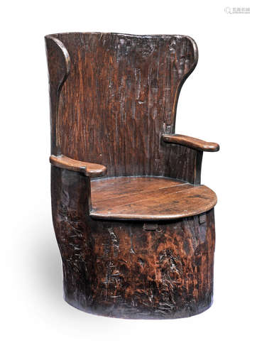 A small 19th century beech and oak dug-out chair