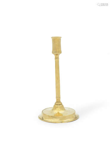 A late 17th/early 18th century brass tavern or coffee house candlestick, English, circa 1700