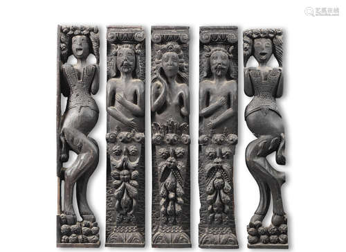 A set of five Elizabeth I carved oak figural terms, from a bed, circa 1600