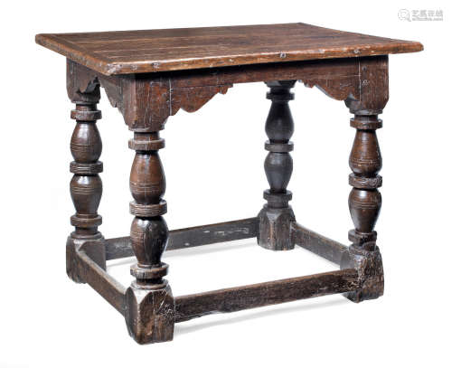 Made to accompany the 'Great Table' - a refectory-type table A rare Elizabeth I joined oak display/serving table, circa 1600