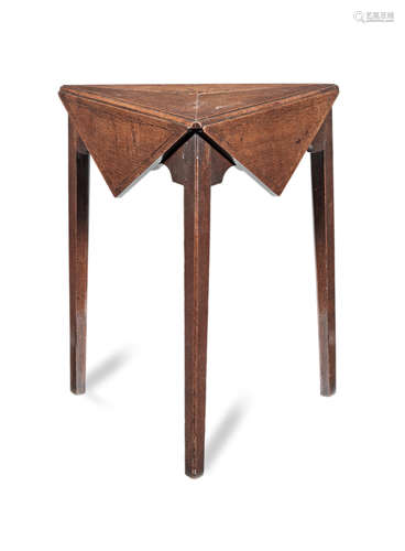 A George III oak swivel-action cricket-type table, circa 1780