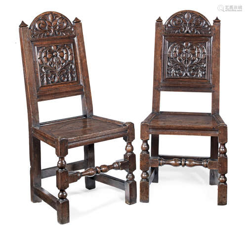 A pair of Charles II joined oak backstools, Lancashire