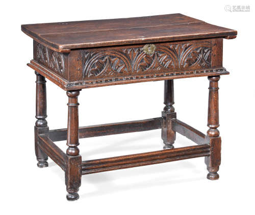 A Charles I joined oak and elm box-top centre table, circa 1640