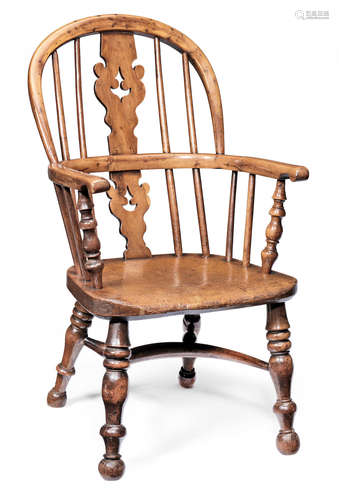 A 19th century yew, elm and ash child's Windsor armchair, Nottinghamshire, circa 1840