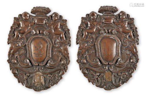 A pair of late 17th/early 18th century bronze wall sconces, circa 1690 - 1710, later engraved