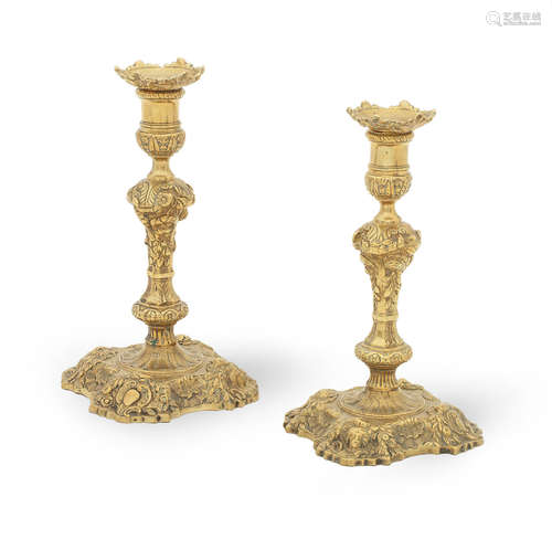 A pair of George II cast brass socket candlesticks, English, circa 1750