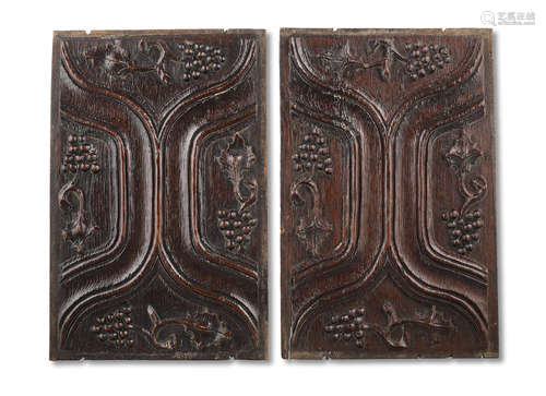 A pair of Henry VIII carved oak panels, of 'parchemin' type, circa 1520-1540