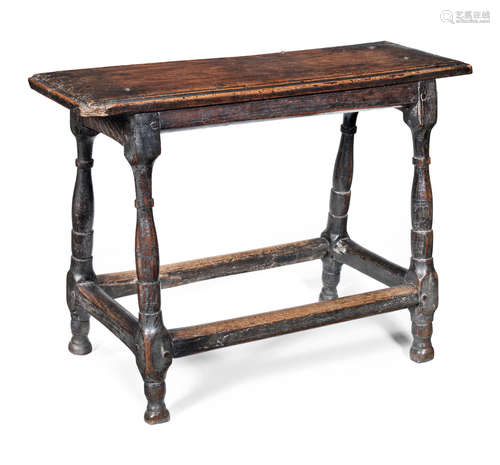 An interesting late 17th/early 18th century fruitwood and oak joint stool, possibly Welsh, circa 1700