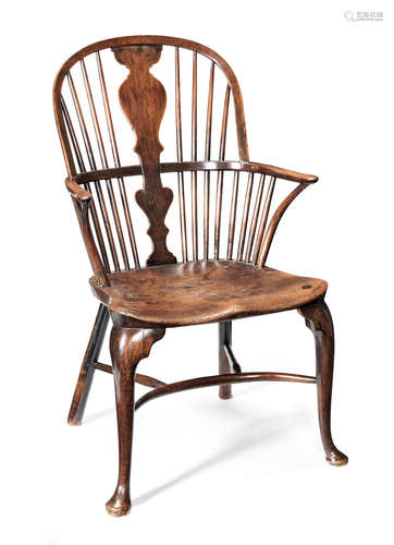 A George III walnut, fruitwood and elm high comb-back Windsor chair, Thames Valley, circa 1790