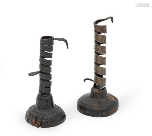 Two 18th/19th century wrought iron spiral ejector candlesticks, French/Continental