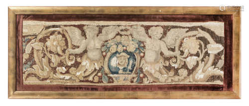 A pair of 17th century tapestry fragments, framed
