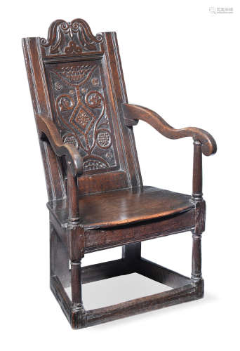 A Charles I joined oak panel-back open armchair, North Country, circa 1640