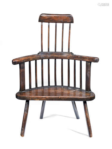 A George III beech, ash and elm primitive comb-back armchair, Pembrokeshire, circa 1800