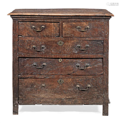 A rare early 18th century solid yew-wood chest of drawers, English, circa 1725