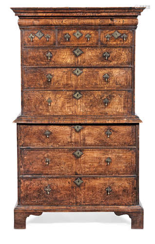 An impressive George I figured elm, ash and walnut chest-on-chest, circa 1715