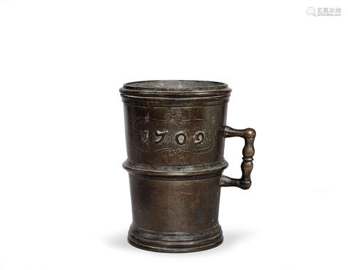 A Queen Anne leaded bronze measure, of gallon capacity, dated 1709