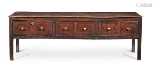 A George III joined oak and fruitwood open low dresser, circa 1760