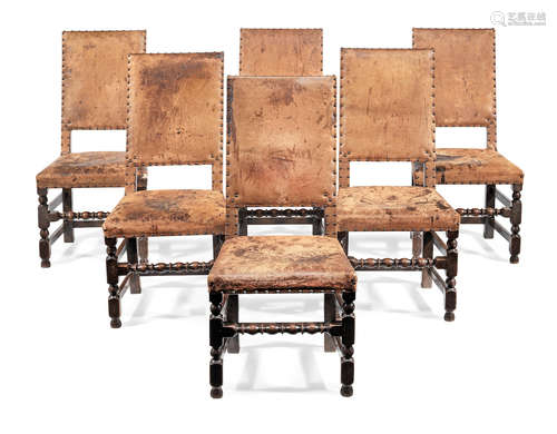 A set of six joined oak and hide-upholstered chairs