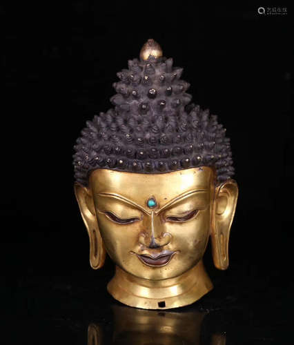 A TIBETAN GILT BRONZE SAKYAMUNI BUDDHA