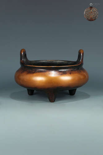 A BRONZE CASTED DOUBLE EAR SHAPED TRIPOD CENSER