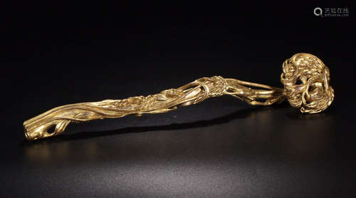 A GILT BRONZE NATURE SHAPED RUYI PENDANT