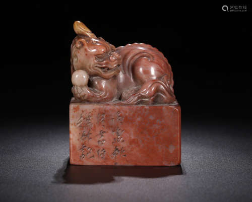 A SOAPSTONE CARVED BEAST SHAPED SEAL