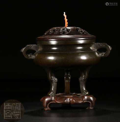 A BRONZE CASTED DOUBLE EAR TRIPOD CENSER