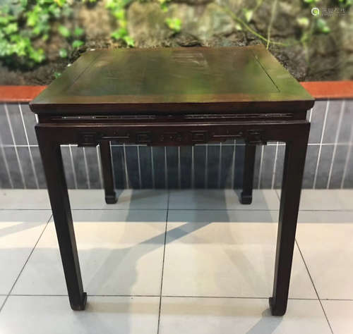 AN OLD RED WOOD CARVED SQUARE TABLE