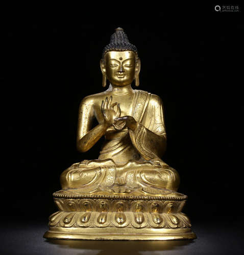 A GILT BRONZE CASTED SAKYAMUNI BUDDHA