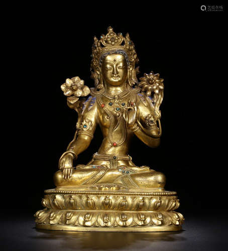 A GILT BRONZE CORAL DECORATED GREEN TARA BUDDHA