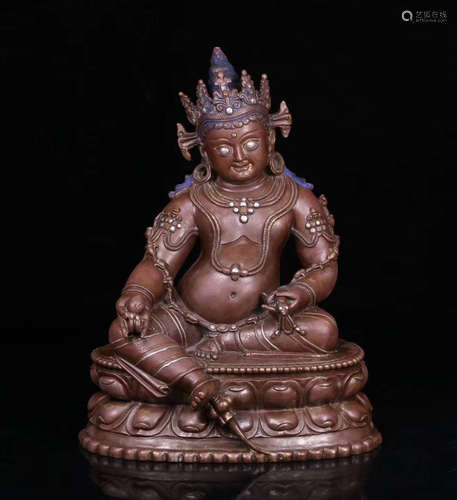 A TIBETAN BRONZE CASTED WEALTH BUDDHA