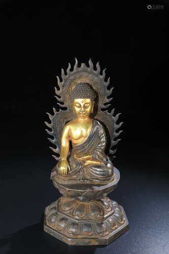 A GILT SILVER SAKYRAMI BUDDHA