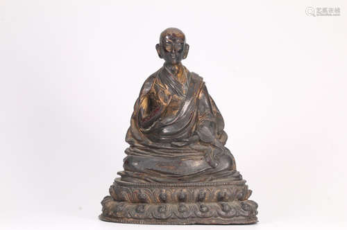 A GILT BRONZE CASTED GURU BUDDHA