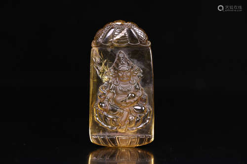 A TIBETAN YELLOW CRYSTAL CARVED PENDANT