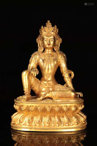 A TIBETAN GILT BRONZE GUANYIN BUDDHA