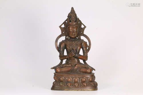 A TIBETAN BRONZE CASTED LIFELESS BUDDHA