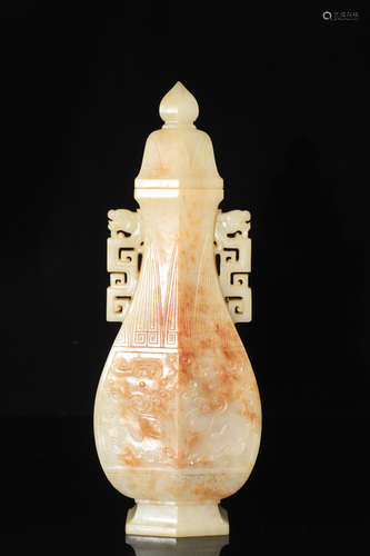 A HETIAN JADE CARVED BEAST PATTERN