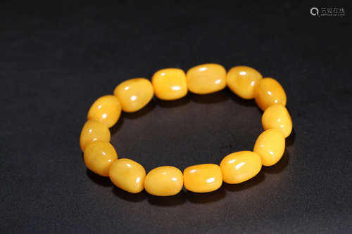 A BEESWAX CARVED BEADS STRING BRACELET