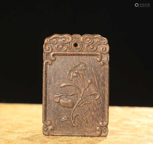 A CHENXIANG WOOD AUSPICIOUS PATTERN PENDANT